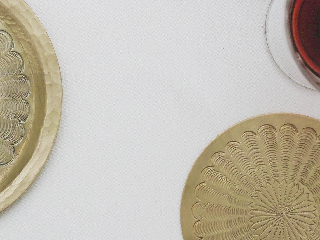 Chiseled brass coaster and wine plate